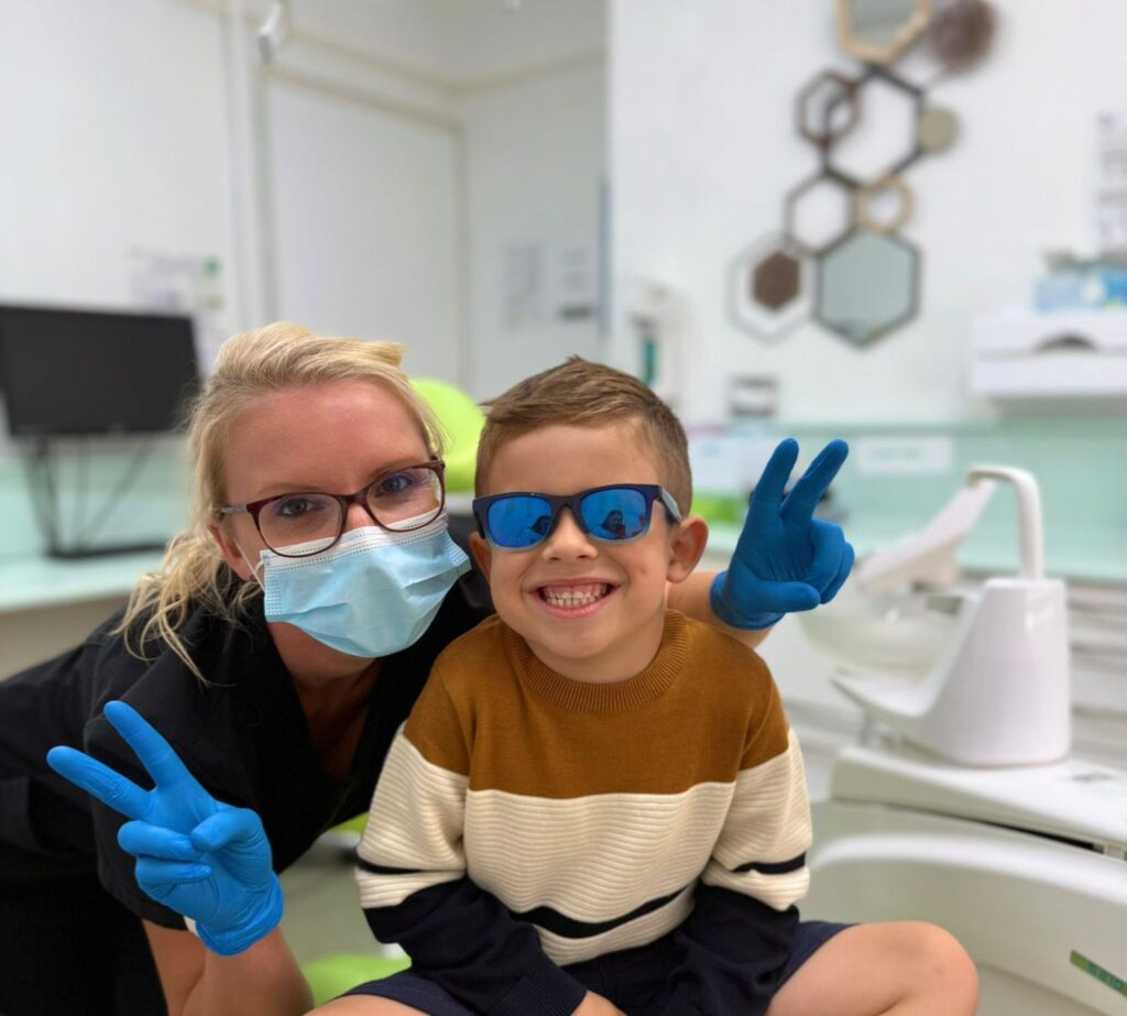 A happy child in the dentist's chair